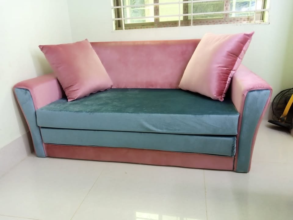 Stylish Sofa Cum Bed-650 made with Pine Wood, Malaysian Process Wood, Rubber Foam, and Artificial Leather/Fabric.